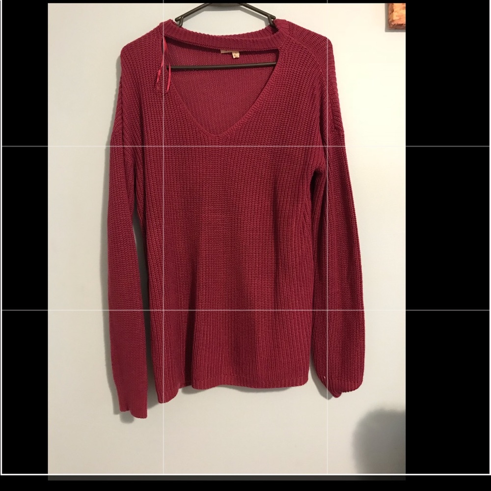 Pink sweater with cut out V in neck